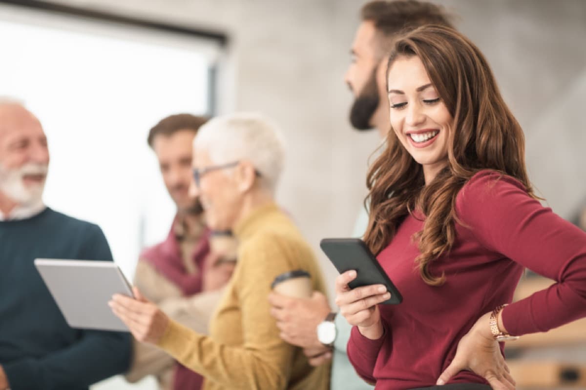Sales team working at laptops